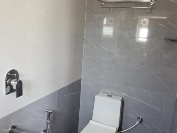 RK COMFORTS : photo 1 de la chambre chambre double ou lits jumeaux deluxe avec balcon