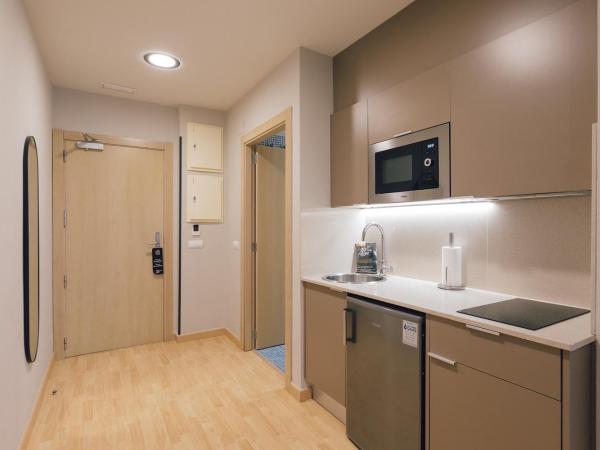 Palau Apartments Valencia : photo 8 de la chambre studio familial