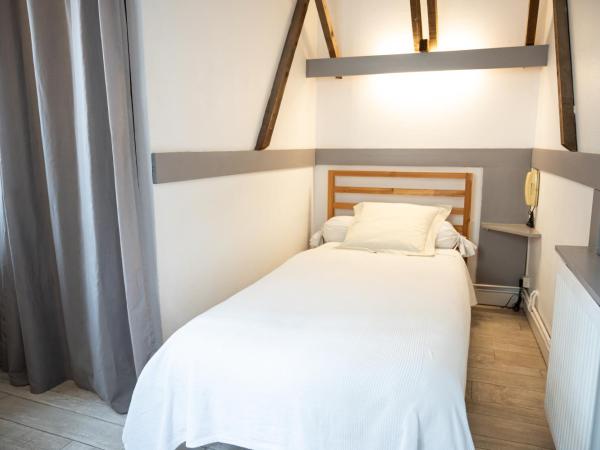 Hôtel-restaurant le Palais : photo 1 de la chambre chambre simple