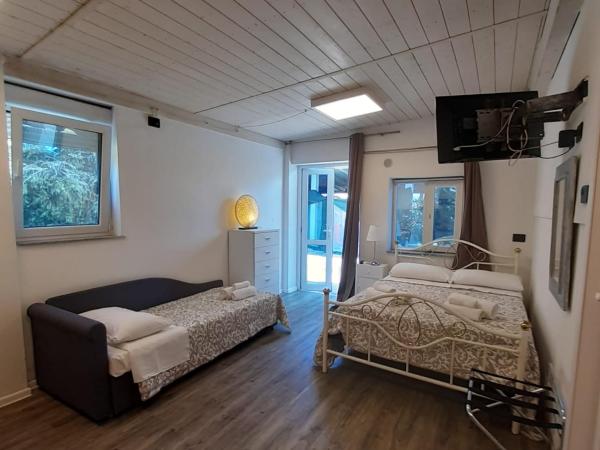 Residenza Le Dimore : photo 6 de la chambre chambre double - vue sur parc