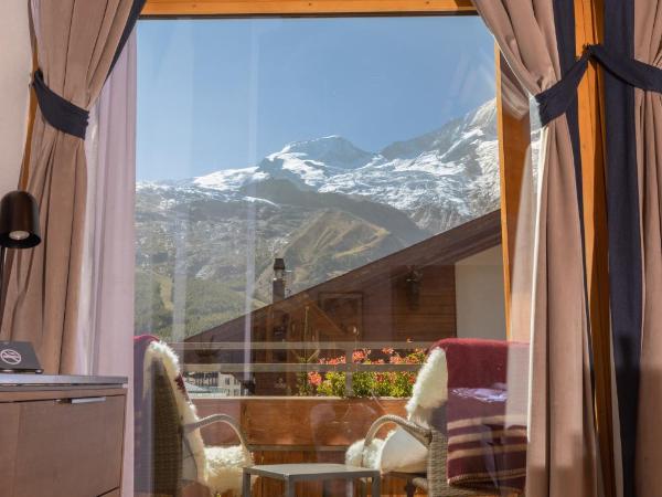 Walliserhof Grand-Hotel & Spa Relais & Châteaux : photo 1 de la chambre suite - vue sur montagne