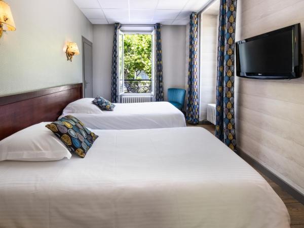 Hotel Beau Rivage : photo 2 de la chambre chambre lits jumeaux