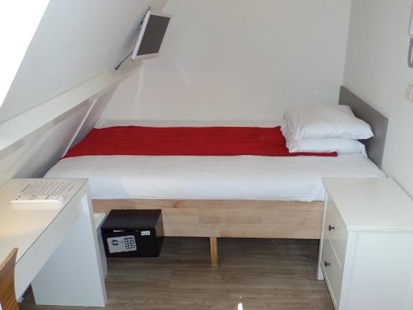 Hotel Corner House : photo 2 de la chambre chambre simple