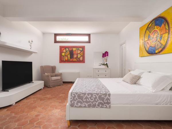 Villa olimpia : photo 3 de la chambre chambre lit king-size