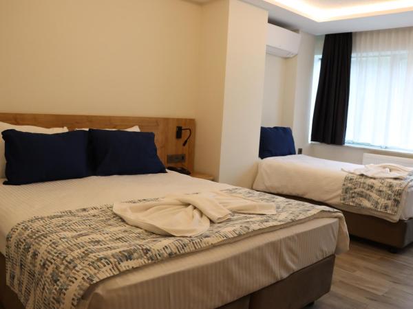 Dab Hotel Ulus : photo 3 de la chambre chambre triple