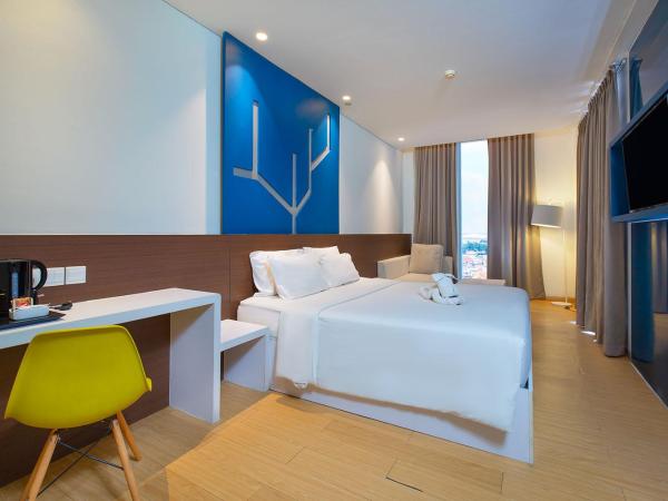 1O1 URBAN Jakarta Pemuda : photo 4 de la chambre suite