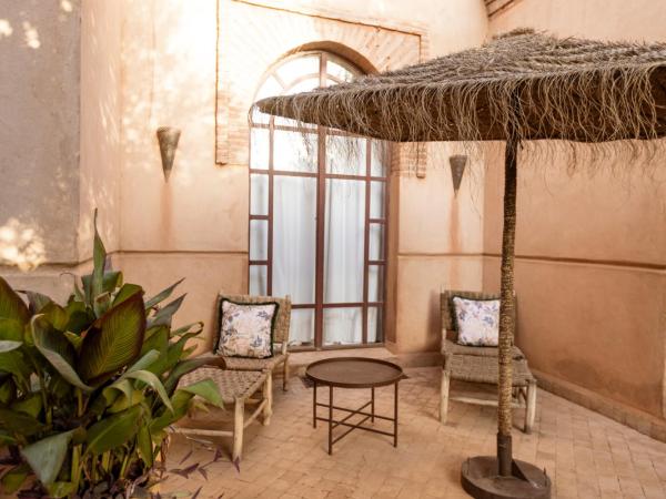 Villa Serena Marrakech - Maison d'hôtes : photo 7 de la chambre chambre double - vue sur jardin