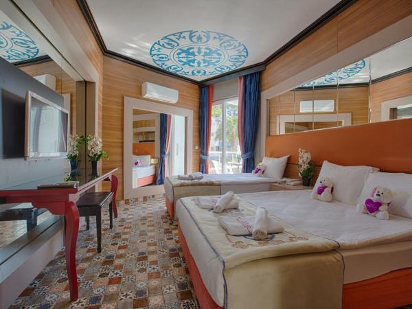 Club Hotel Anjeliq : photo 2 de la chambre chambre triple classique