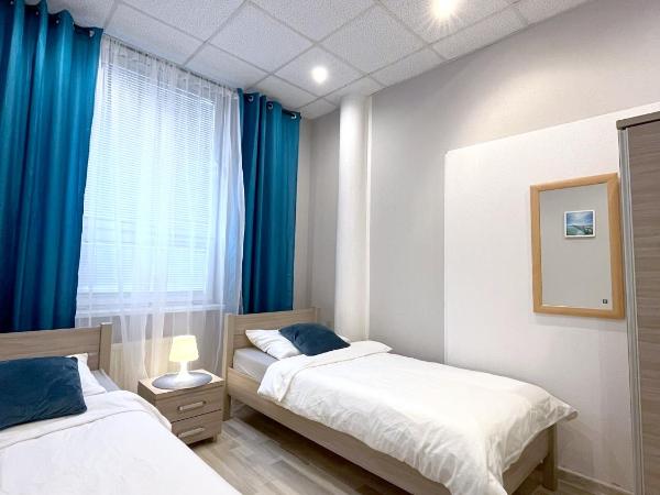 Keja Rooms - Pokoje Noclegi w Centrum Gdyni : photo 1 de la chambre chambre double avec 2 lits doubles