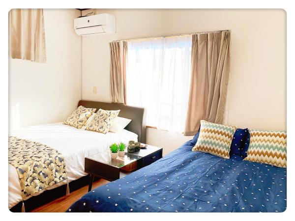 TOKYO/Shinjuku & Shibuya 10mins/5mins walk to subway stiaon/Kichijoji 15mins/Shimokitazawa 5mins/Louis House : photo 6 de la chambre chambre triple avec toilettes communes