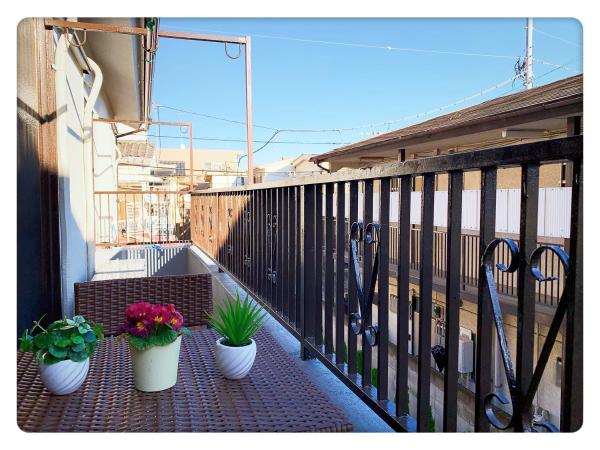 TOKYO/Shinjuku & Shibuya 10mins/5mins walk to subway stiaon/Kichijoji 15mins/Shimokitazawa 5mins/Louis House : photo 4 de la chambre chambre double avec toilettes communes