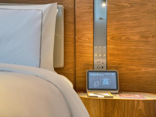 UrCove by HYATT Hangzhou North Grand Canal : photo 2 de la chambre chambre lit king-size supérieure