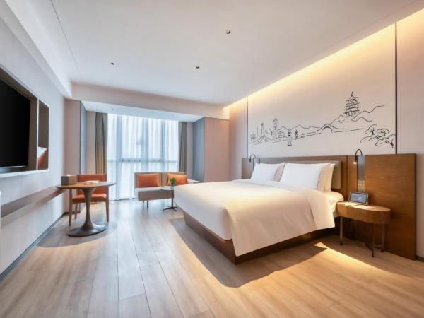 UrCove by HYATT Hangzhou North Grand Canal : photo 1 de la chambre chambre lit king-size deluxe