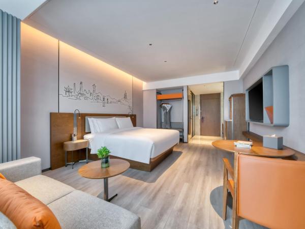 UrCove by HYATT Hangzhou North Grand Canal : photo 1 de la chambre chambre lit king-size exécutive