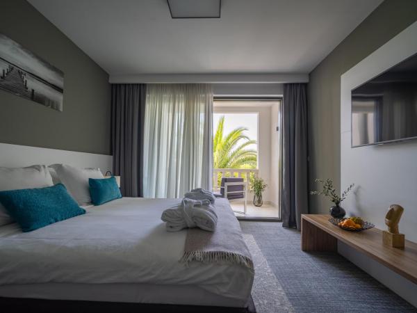 Residence Vaal : photo 2 de la chambre deluxe double room with balcony - pool view