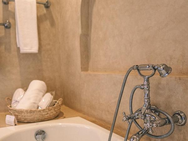 Domaine Des Remparts Hotel & Spa : photo 5 de la chambre suite deluxe - vue sur piscine