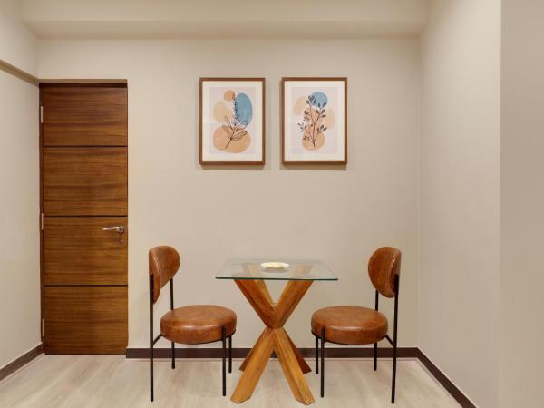 Lemon Tree Suites, Whitefield, Bengaluru : photo 1 de la chambre suite lit king-size