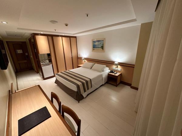 Riale Vilamar Copacabana : photo 1 de la chambre chambre supérieure avec lit double