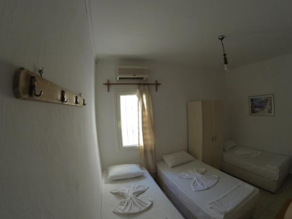 Merhaba Pansiyon : photo 7 de la chambre chambre triple