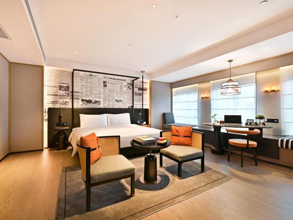广州萝岗科学城骑士物语酒店Arthur Hotel Luogang Guangzhou-Free Shuttle Bus For Canton Fair : photo 1 de la chambre chambre lit king-size deluxe