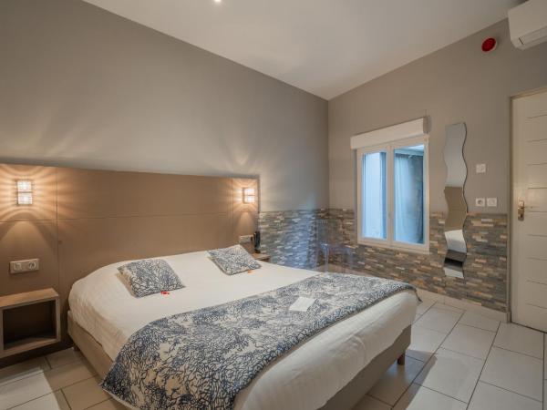 Hotel Le Grand Pavois : photo 1 de la chambre chambre double - accessible aux personnes à mobilité réduite 