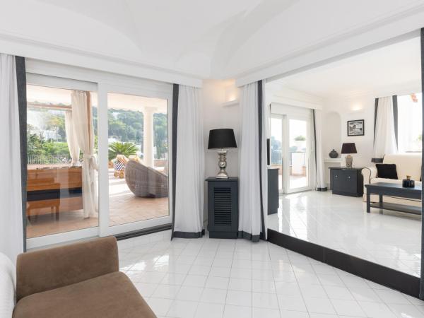 Hotel Mamela : photo 1 de la chambre suite avec baignoire spa