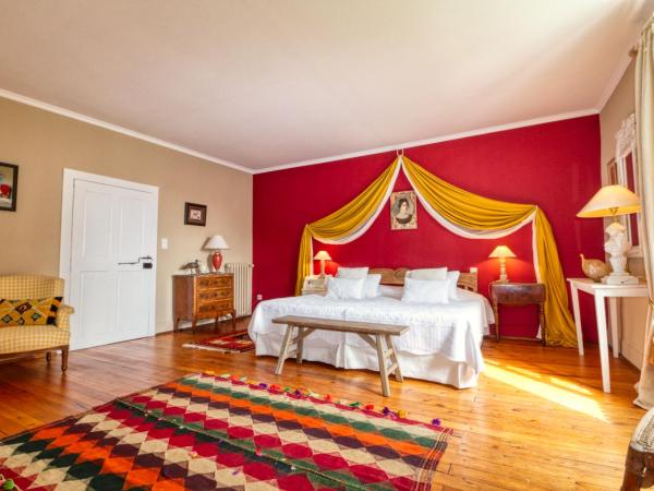 Mas d'Escattes : photo 3 de la chambre chambre double ou lits jumeaux - vue sur jardin