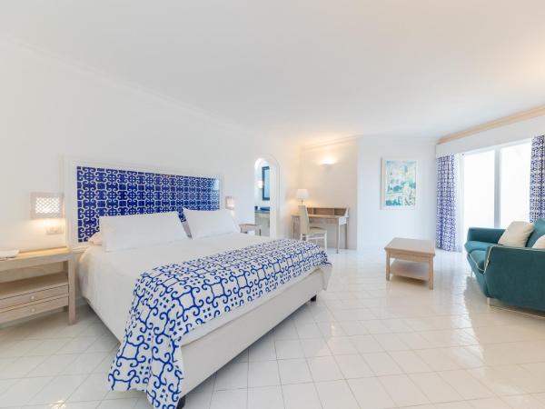 Hotel Mamela : photo 2 de la chambre chambre double ou lits jumeaux - vue partielle sur mer