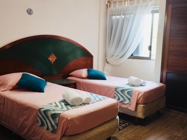 Cancun Ocean View FLAMINGO PLUS : photo 1 de la chambre chambre lits jumeaux