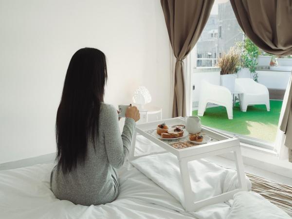 San Michele Luxury Rooms : photo 5 de la chambre chambre lit king-size avec baignoire spa