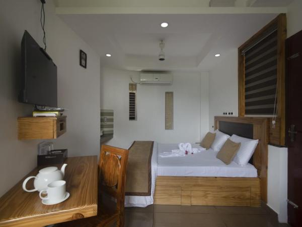 Magni Home : photo 3 de la chambre chambre deluxe (2 adultes + 1 enfant)