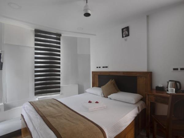 Magni Home : photo 2 de la chambre chambre lit queen-size deluxe