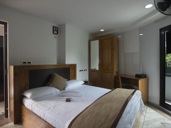 Magni Home : photo 3 de la chambre chambre lit king-size avec balcon