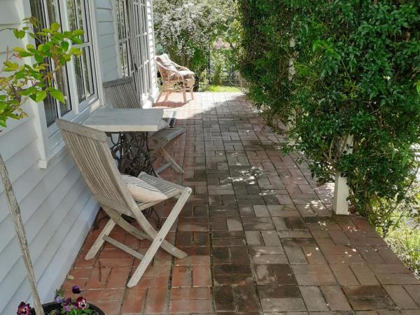 Magnolia Cottage : photo 8 de la chambre suite - vue sur jardin