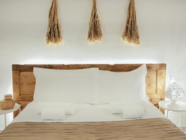 San Michele Luxury Rooms : photo 7 de la chambre chambre lit king-size avec baignoire spa