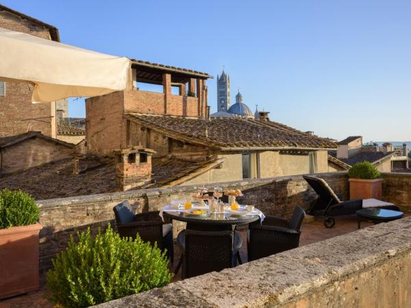 Grand Hotel Continental Siena - Starhotels Collezione : photo 8 de la chambre chambre double ou lits jumeaux deluxe avec terrasse