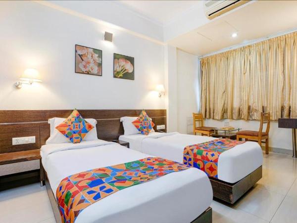 Gandharva Residency Swargate : photo 7 de la chambre chambre deluxe double ou lits jumeaux