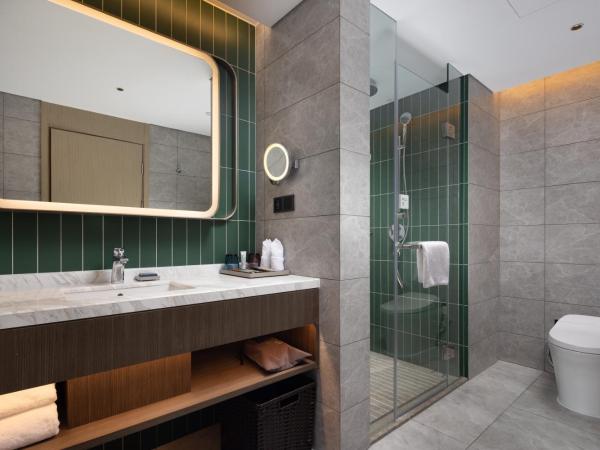 Home2 Suites by Hilton Beijing West Station : photo 1 de la chambre suite - vue sur jardin