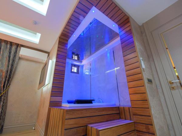 Elysium Deluxe Suites Antalya : photo 5 de la chambre suite deluxe avec baignoire spa