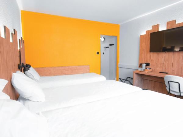 Hôtel Les 2 Alpes L'Orée Des Pistes : photo 1 de la chambre chambre triple avec balcon