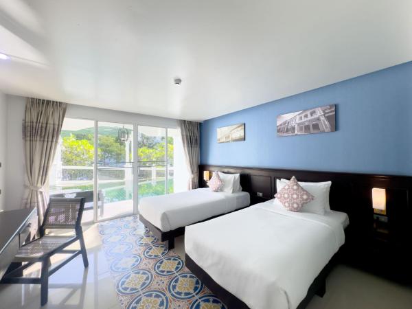 Grand Supicha City Hotel - SHA Plus : photo 2 de la chambre chambre lits jumeaux avec accès à la piscine