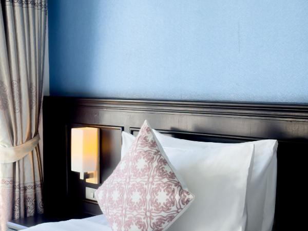 Grand Supicha City Hotel - SHA Plus : photo 5 de la chambre chambre lits jumeaux avec accès à la piscine