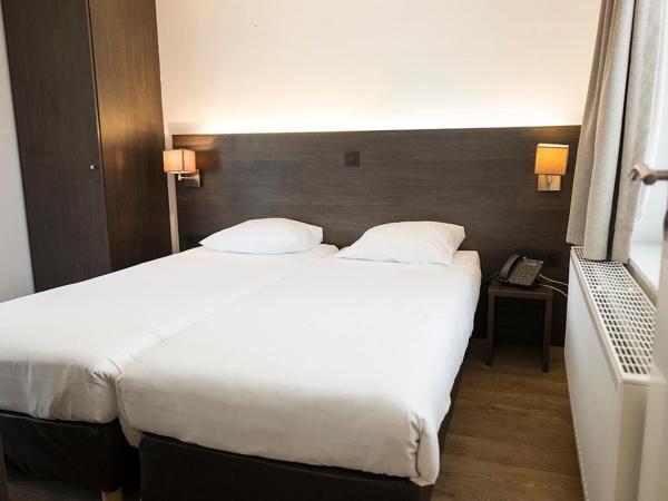 3 Paardekens - City Centre Hotel : photo 1 de la chambre chambre lits jumeaux