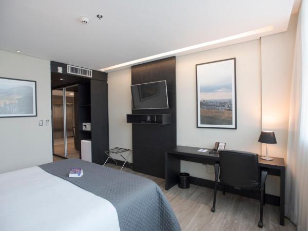 Tryp by Wyndham Belo Horizonte Savassi : photo 2 de la chambre suite lit queen-size premium - non-fumeurs