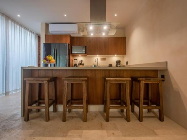 Copal Tulum Hotel : photo 5 de la chambre appartement de luxe jungle 2 chambres avec 1 lit king-size, 2 lits simples, 1 canapé-lit king-size et terrasse - vue sur jardin