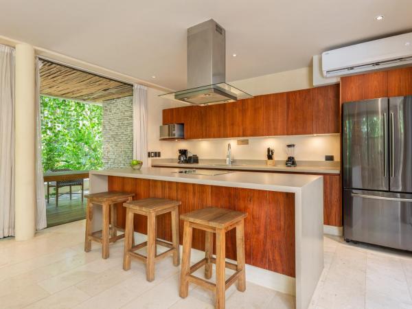 Copal Tulum Hotel : photo 1 de la chambre appartement de luxe jungle 4 chambres avec 2 lits king-size, 4 lits simples et 1 canapé-lit king-size - vue sur jardin