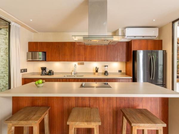 Copal Tulum Hotel : photo 1 de la chambre appartement de luxe jungle 2 chambres avec 1 lit king-size, 2 lits simples, 1 canapé-lit king-size et piscine privée - vue sur jardin