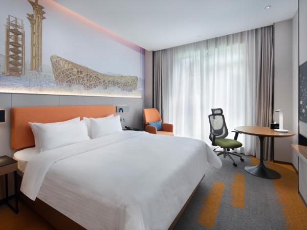 Hampton by Hilton Beijing South Railway Station : photo 2 de la chambre chambre double confort - vue sur jardin