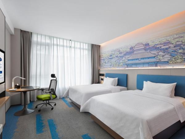 Hampton by Hilton Beijing South Railway Station : photo 3 de la chambre chambre lits jumeaux deluxe avec vue sur le jardin