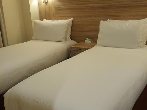 Holiday Inn London Kensington High St., an IHG Hotel : photo 1 de la chambre chambre lits jumeaux standard